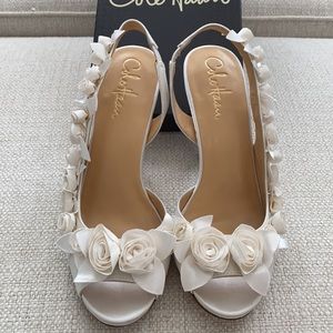 Cole Haan White Satin Rose Sling Heel. Size 6B